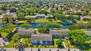 Stunning Corner Unit Condo - Fully Furnished & Move-In on Hillsboro Pines Golf in Florida - for sale on GolfHomes.com, golf home, golf lot