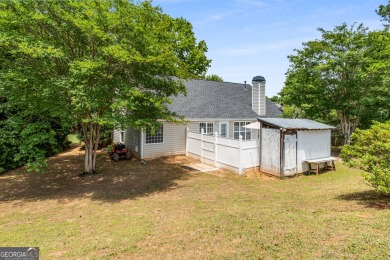 This beautifully renovated ranch-style home, located in a on Summergrove Golf Club in Georgia - for sale on GolfHomes.com, golf home, golf lot