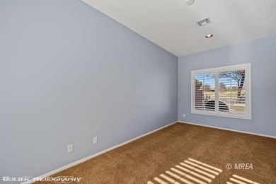 Gorgeous townhome right on the golf course! Spacious rooms and a on The Oasis Golf Club in Nevada - for sale on GolfHomes.com, golf home, golf lot