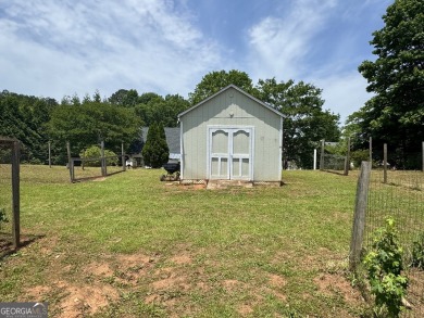 This beautifully renovated ranch-style home, located in a on Summergrove Golf Club in Georgia - for sale on GolfHomes.com, golf home, golf lot