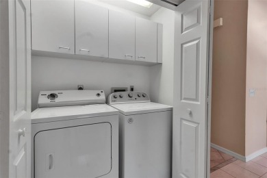 This 2 bedroom, 2 bath villa with 2 car garage offers an on TPC Prestancia in Florida - for sale on GolfHomes.com, golf home, golf lot