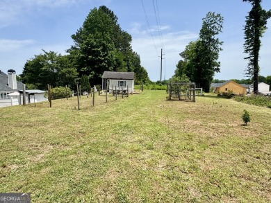 This beautifully renovated ranch-style home, located in a on Summergrove Golf Club in Georgia - for sale on GolfHomes.com, golf home, golf lot
