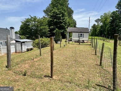 This beautifully renovated ranch-style home, located in a on Summergrove Golf Club in Georgia - for sale on GolfHomes.com, golf home, golf lot