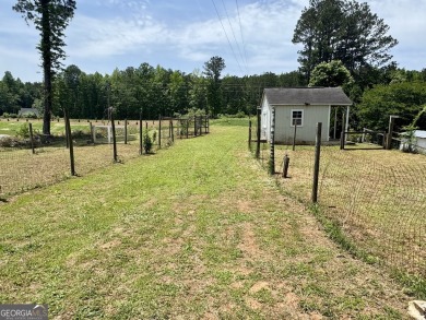 This beautifully renovated ranch-style home, located in a on Summergrove Golf Club in Georgia - for sale on GolfHomes.com, golf home, golf lot