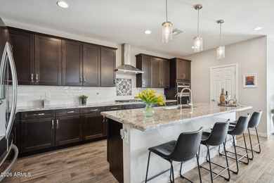 Set on a premium corner lot in the heart of Estrella Mountain on Estrella Mountain Ranch Golf Course in Arizona - for sale on GolfHomes.com, golf home, golf lot