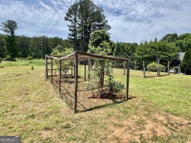 This beautifully renovated ranch-style home, located in a on Summergrove Golf Club in Georgia - for sale on GolfHomes.com, golf home, golf lot
