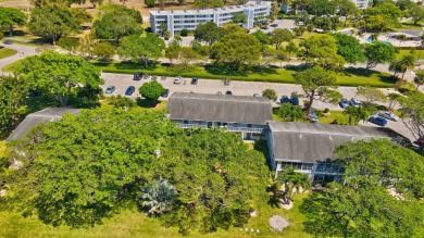 Stunning Corner Unit Condo - Fully Furnished & Move-In on Hillsboro Pines Golf in Florida - for sale on GolfHomes.com, golf home, golf lot