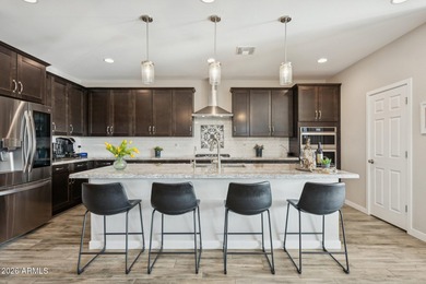 Set on a premium corner lot in the heart of Estrella Mountain on Estrella Mountain Ranch Golf Course in Arizona - for sale on GolfHomes.com, golf home, golf lot