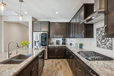 Set on a premium corner lot in the heart of Estrella Mountain on Estrella Mountain Ranch Golf Course in Arizona - for sale on GolfHomes.com, golf home, golf lot