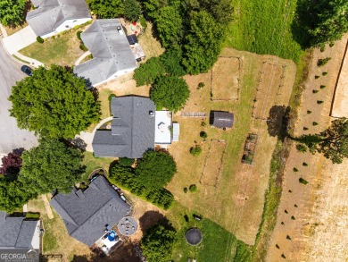 This beautifully renovated ranch-style home, located in a on Summergrove Golf Club in Georgia - for sale on GolfHomes.com, golf home, golf lot
