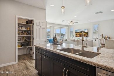 Set on a premium corner lot in the heart of Estrella Mountain on Estrella Mountain Ranch Golf Course in Arizona - for sale on GolfHomes.com, golf home, golf lot