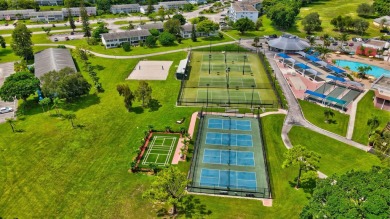 Stunning Corner Unit Condo - Fully Furnished & Move-In on Hillsboro Pines Golf in Florida - for sale on GolfHomes.com, golf home, golf lot