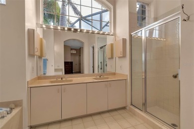 This 2 bedroom, 2 bath villa with 2 car garage offers an on TPC Prestancia in Florida - for sale on GolfHomes.com, golf home, golf lot