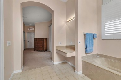This 2 bedroom, 2 bath villa with 2 car garage offers an on TPC Prestancia in Florida - for sale on GolfHomes.com, golf home, golf lot