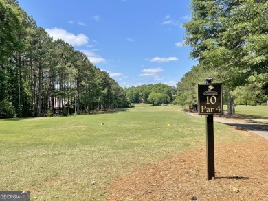 This beautifully renovated ranch-style home, located in a on Summergrove Golf Club in Georgia - for sale on GolfHomes.com, golf home, golf lot