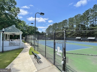 This beautifully renovated ranch-style home, located in a on Summergrove Golf Club in Georgia - for sale on GolfHomes.com, golf home, golf lot