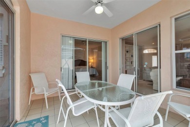 This 2 bedroom, 2 bath villa with 2 car garage offers an on TPC Prestancia in Florida - for sale on GolfHomes.com, golf home, golf lot