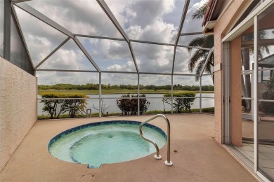 This 2 bedroom, 2 bath villa with 2 car garage offers an on TPC Prestancia in Florida - for sale on GolfHomes.com, golf home, golf lot
