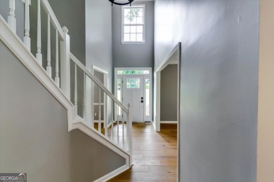 Embrace luxury living at its finest in this fully renovated on Canongate At Olde Atlanta Golf Club in Georgia - for sale on GolfHomes.com, golf home, golf lot