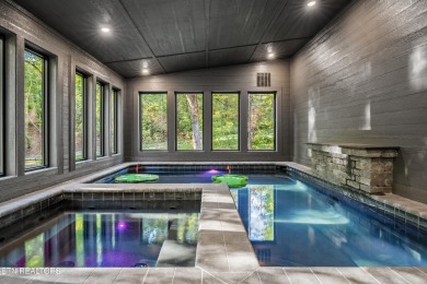 Discover a one-of-a-kind luxury retreat in the heart of Pigeon on Gatlinburg Golf Course in Tennessee - for sale on GolfHomes.com, golf home, golf lot
