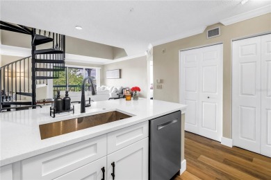 Under contract-accepting backup offers. Stylish 2BR/1BA Condo in on Feather Sound Country Club in Florida - for sale on GolfHomes.com, golf home, golf lot