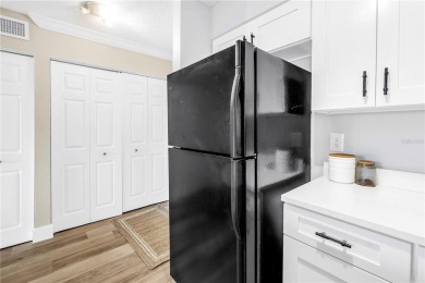 Under contract-accepting backup offers. Stylish 2BR/1BA Condo in on Feather Sound Country Club in Florida - for sale on GolfHomes.com, golf home, golf lot