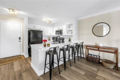 Under contract-accepting backup offers. Stylish 2BR/1BA Condo in on Feather Sound Country Club in Florida - for sale on GolfHomes.com, golf home, golf lot