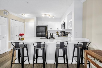 Under contract-accepting backup offers. Stylish 2BR/1BA Condo in on Feather Sound Country Club in Florida - for sale on GolfHomes.com, golf home, golf lot