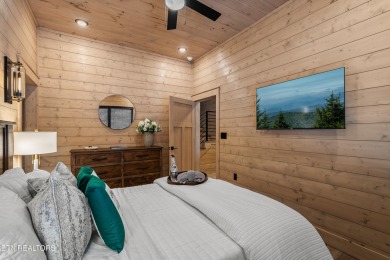Discover a one-of-a-kind luxury retreat in the heart of Pigeon on Gatlinburg Golf Course in Tennessee - for sale on GolfHomes.com, golf home, golf lot