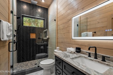 Discover a one-of-a-kind luxury retreat in the heart of Pigeon on Gatlinburg Golf Course in Tennessee - for sale on GolfHomes.com, golf home, golf lot