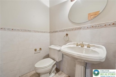 Experience refined luxury and serene privacy in this exceptional on Caesars Pocono Palace Resort in Pennsylvania - for sale on GolfHomes.com, golf home, golf lot