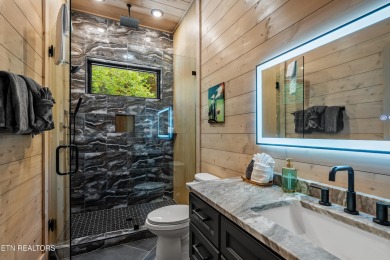 Discover a one-of-a-kind luxury retreat in the heart of Pigeon on Gatlinburg Golf Course in Tennessee - for sale on GolfHomes.com, golf home, golf lot