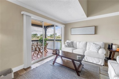 Under contract-accepting backup offers. Stylish 2BR/1BA Condo in on Feather Sound Country Club in Florida - for sale on GolfHomes.com, golf home, golf lot