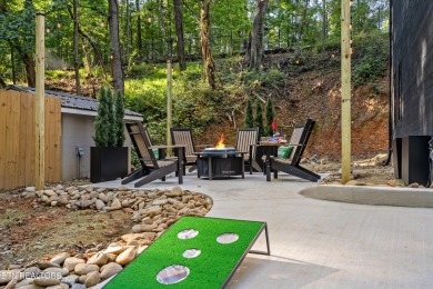 Discover a one-of-a-kind luxury retreat in the heart of Pigeon on Gatlinburg Golf Course in Tennessee - for sale on GolfHomes.com, golf home, golf lot
