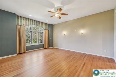 Experience refined luxury and serene privacy in this exceptional on Caesars Pocono Palace Resort in Pennsylvania - for sale on GolfHomes.com, golf home, golf lot