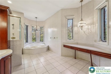 Experience refined luxury and serene privacy in this exceptional on Caesars Pocono Palace Resort in Pennsylvania - for sale on GolfHomes.com, golf home, golf lot