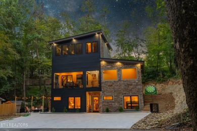 Discover a one-of-a-kind luxury retreat in the heart of Pigeon on Gatlinburg Golf Course in Tennessee - for sale on GolfHomes.com, golf home, golf lot
