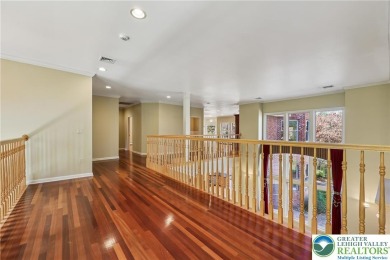 Experience refined luxury and serene privacy in this exceptional on Caesars Pocono Palace Resort in Pennsylvania - for sale on GolfHomes.com, golf home, golf lot