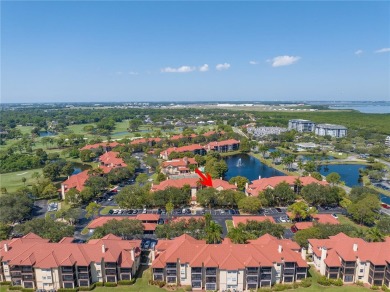 Under contract-accepting backup offers. Stylish 2BR/1BA Condo in on Feather Sound Country Club in Florida - for sale on GolfHomes.com, golf home, golf lot
