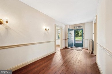 Discover a rare blend of history, character, and comfort in this on Flourtown Country Club in Pennsylvania - for sale on GolfHomes.com, golf home, golf lot