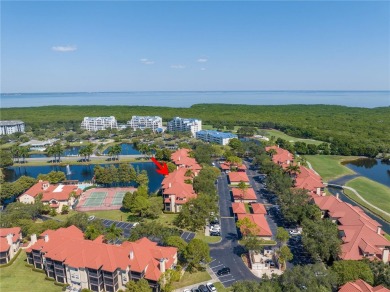 Under contract-accepting backup offers. Stylish 2BR/1BA Condo in on Feather Sound Country Club in Florida - for sale on GolfHomes.com, golf home, golf lot