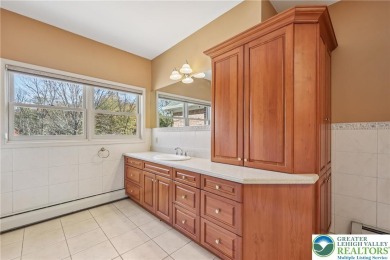 Experience refined luxury and serene privacy in this exceptional on Caesars Pocono Palace Resort in Pennsylvania - for sale on GolfHomes.com, golf home, golf lot