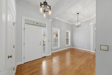 Located on a quiet cul-de-sac in Winding River Plantation, this on Carolina National Golf Club in North Carolina - for sale on GolfHomes.com, golf home, golf lot