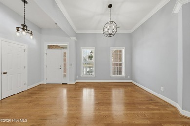 Located on a quiet cul-de-sac in Winding River Plantation, this on Carolina National Golf Club in North Carolina - for sale on GolfHomes.com, golf home, golf lot