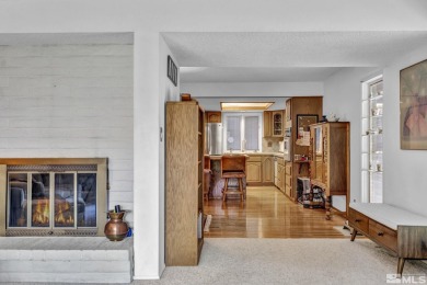 Love where you live in this beautifully maintained end-unit on LakeRidge Golf Course in Nevada - for sale on GolfHomes.com, golf home, golf lot