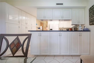Near the beach!  Storm ready! 55+, turnkey Sarasota furnished on Village Green Golf Club of Sarasota in Florida - for sale on GolfHomes.com, golf home, golf lot