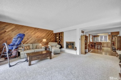 Love where you live in this beautifully maintained end-unit on LakeRidge Golf Course in Nevada - for sale on GolfHomes.com, golf home, golf lot