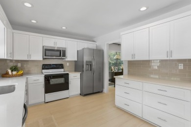 Step into elevated South Florida living with this fully on Boca Greens Country Club in Florida - for sale on GolfHomes.com, golf home, golf lot