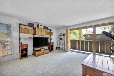 Love where you live in this beautifully maintained end-unit on LakeRidge Golf Course in Nevada - for sale on GolfHomes.com, golf home, golf lot