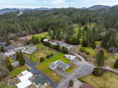 Opportunity knocks! This 3-bedroom, 2-bath home sits on a on Grants Pass Golf Club in Oregon - for sale on GolfHomes.com, golf home, golf lot